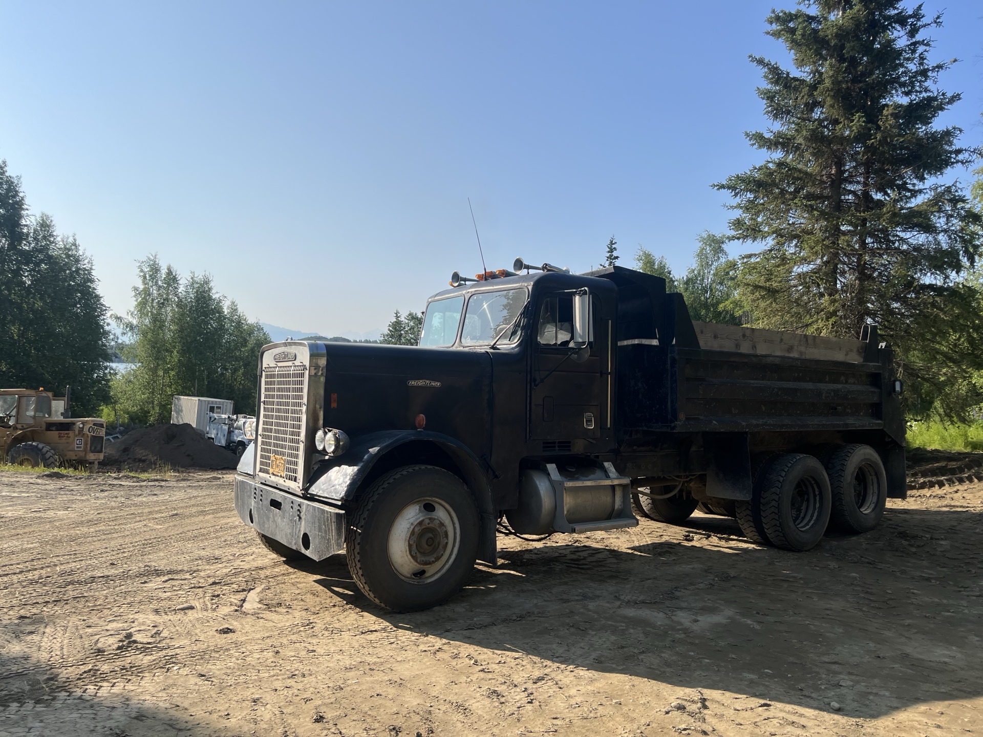 Dump truck at summer job site